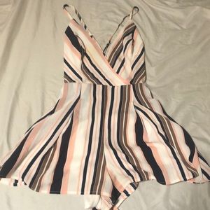 Striped pink and blue romper